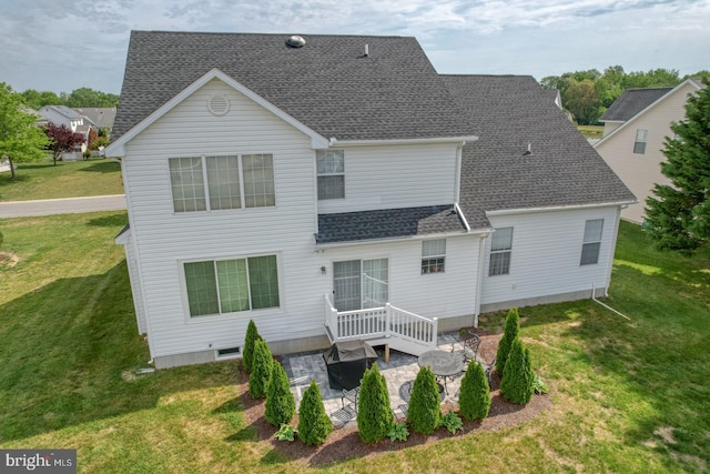 17 Fairway St, Milford, DE 19963 - back of property featuring a lawn, a patio, and a shingled roof
