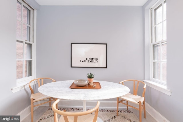 dining room featuring baseboards