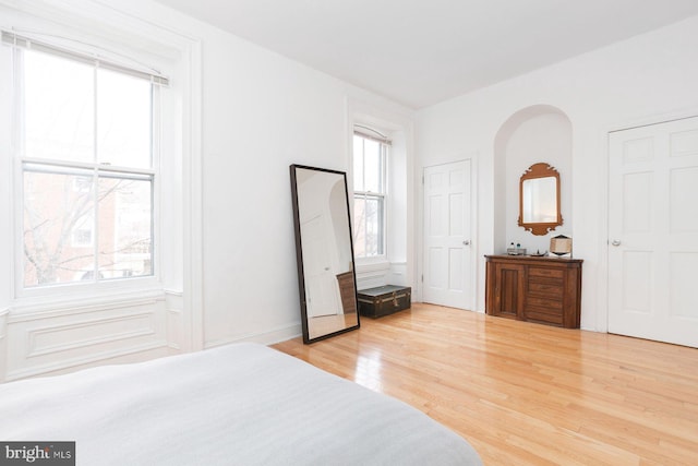 bedroom with light wood-style floors