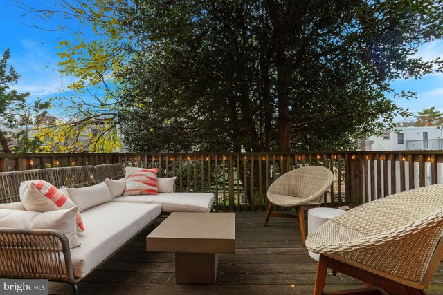 deck with an outdoor hangout area