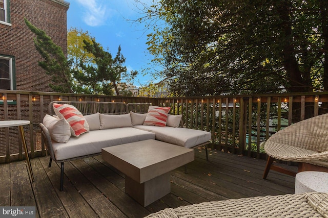 deck featuring outdoor lounge area