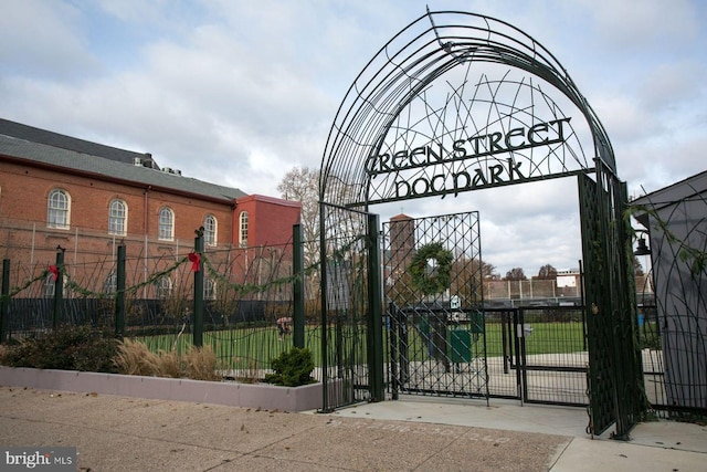view of gate featuring fence