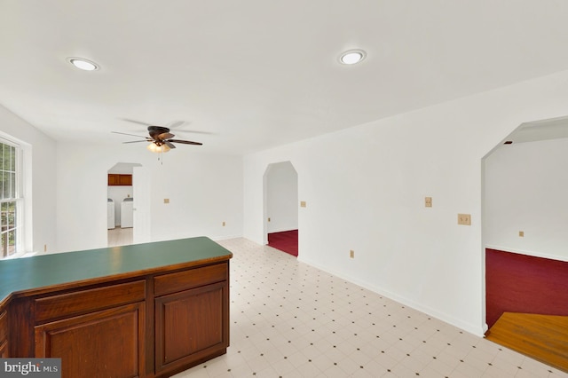 2208 Quarry Rd, Bunker Hill, WV 25413 - interior space with a ceiling fan, light floors, recessed lighting, washer and clothes dryer, and arched walkways