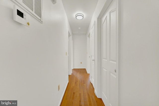 2208 Quarry Rd, Bunker Hill, WV 25413 - corridor with light wood-type flooring and baseboards
