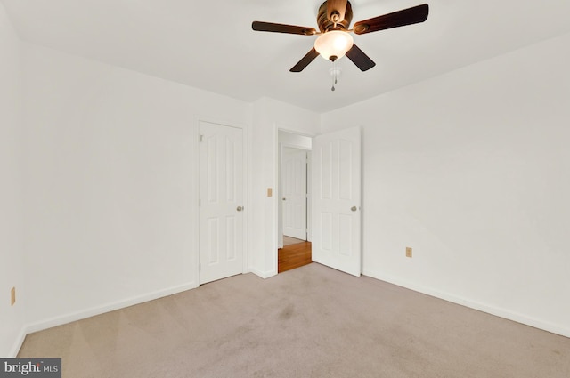 2208 Quarry Rd, Bunker Hill, WV 25413 - unfurnished bedroom featuring baseboards, carpet, and ceiling fan