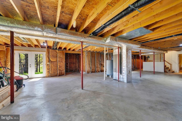 2208 Quarry Rd, Bunker Hill, WV 25413 - basement with water heater, stairway, and french doors