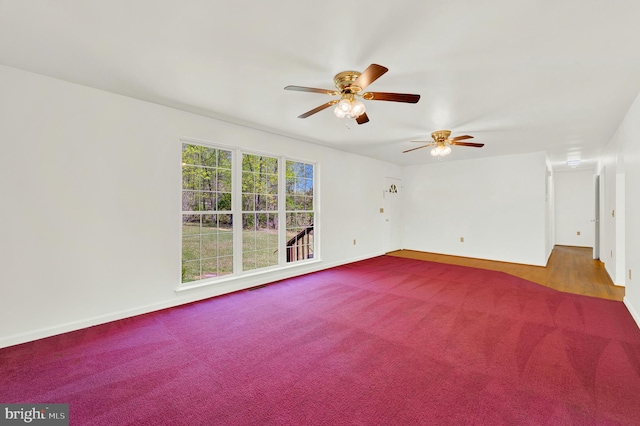 2208 Quarry Rd, Bunker Hill, WV 25413 - unfurnished room with baseboards, carpet, and a ceiling fan