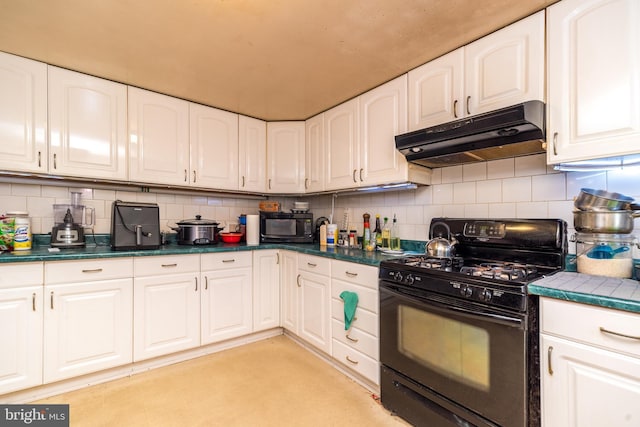 kitchen featuring black appliances, under cabinet range hood, tasteful backsplash, and white cabinetry