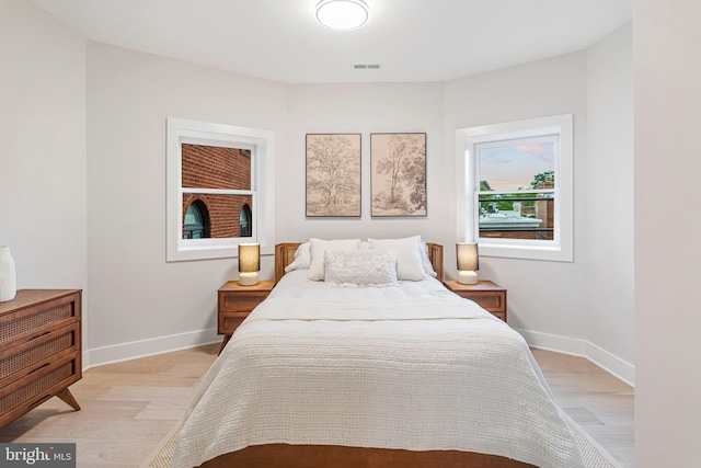 1724 Connecticut Ave NW Unit 1, Washington, DC 20009 - bedroom with light wood-style floors and baseboards