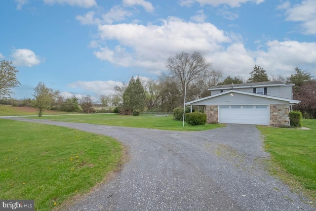10905 Keysville Rd, Emmitsburg, MD 21727 - view of front of house with a garage, driveway, stone siding, and a front yard