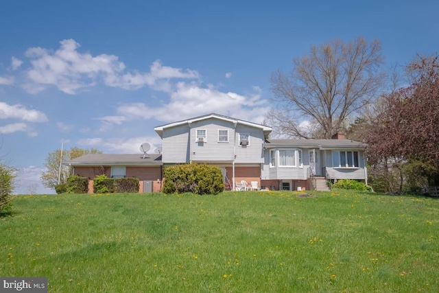 10905 Keysville Rd, Emmitsburg, MD 21727 - back of property with brick siding, a yard, central AC, and a chimney