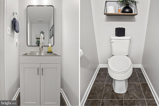half bathroom with baseboards, tile patterned floors, toilet, and vanity