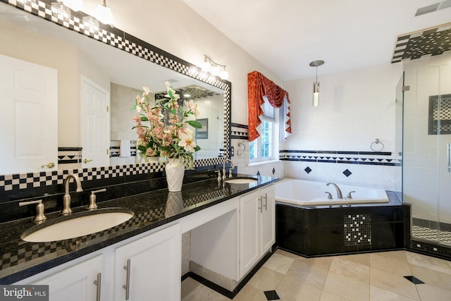 6420 Barrington Dr, Frederick, MD 21701 - full bathroom featuring a sink, visible vents, a bath, and a stall shower