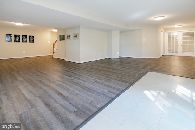 6420 Barrington Dr, Frederick, MD 21701 - unfurnished living room featuring stairs, french doors, baseboards, and wood finished floors