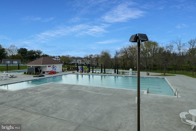 6420 Barrington Dr, Frederick, MD 21701 - pool with a patio area and fence