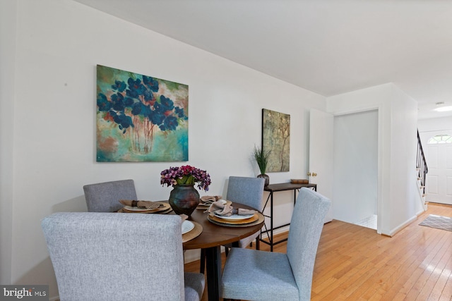 14311 Astrodome Dr Unit 6, Silver Spring, MD 20906 - dining room featuring light wood-style floors and stairs