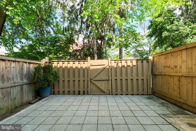 14311 Astrodome Dr Unit 6, Silver Spring, MD 20906 - view of patio featuring a gate and fence