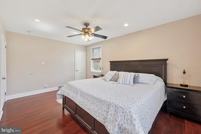 bedroom featuring recessed lighting, dark wood finished floors, a ceiling fan, and baseboards