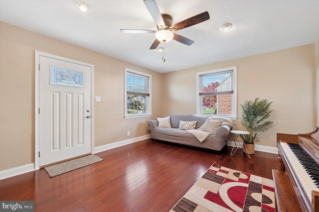 living room with recessed lighting, wood finished floors, a ceiling fan, and baseboards