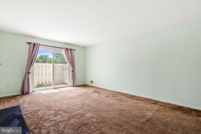 1 Huber Ct, Hightstown, NJ 08520 - spare room featuring carpet and baseboards