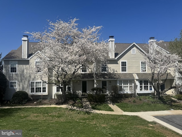 2410 Mallard Ln, Downingtown, PA 19335 - view of front of home with a chimney and a front yard