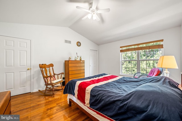 2410 Mallard Ln, Downingtown, PA 19335 - bedroom with visible vents, vaulted ceiling, wood finished floors, and a ceiling fan