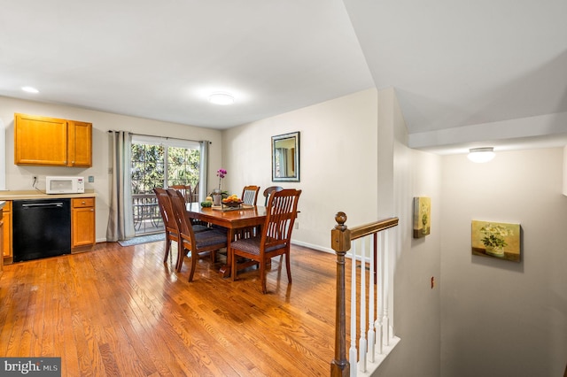 2410 Mallard Ln, Downingtown, PA 19335 - dining room with light wood-type flooring and baseboards