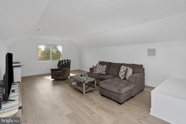11 Bridge Rd, Lumberton, NJ 08048 - living room featuring vaulted ceiling, visible vents, light wood finished floors, and baseboards