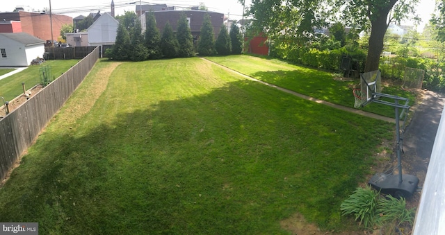 view of yard featuring fence private yard