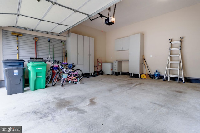 garage featuring a garage door opener