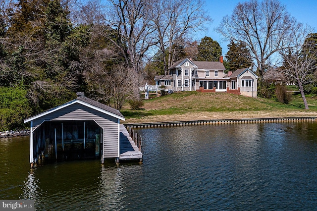 391 Steamboat Rd, Irvington, VA 22480 - view of dock with a water view and a yard