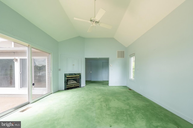 391 Steamboat Rd, Irvington, VA 22480 - unfurnished living room with a premium fireplace, carpet flooring, a ceiling fan, and visible vents