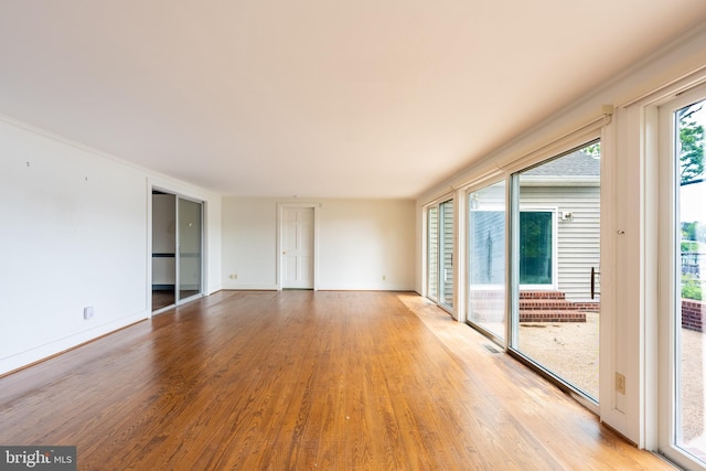391 Steamboat Rd, Irvington, VA 22480 - unfurnished room featuring wood finished floors and baseboards