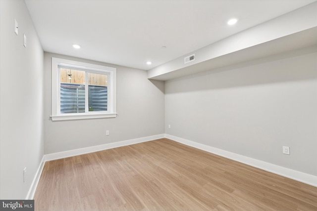 empty room with recessed lighting, visible vents, baseboards, and light wood-style flooring