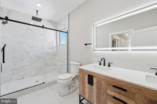 full bathroom with toilet, marble finish floor, a sink, a marble finish shower, and double vanity