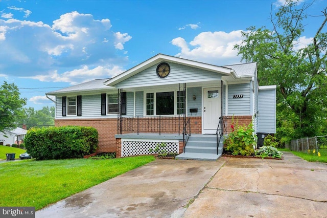 7533 Dover Ln, Lanham, MD 20706 - view of front of home featuring brick siding and a porch