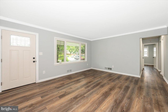 7533 Dover Ln, Lanham, MD 20706 - entrance foyer featuring ornamental molding, dark wood finished floors, and baseboards