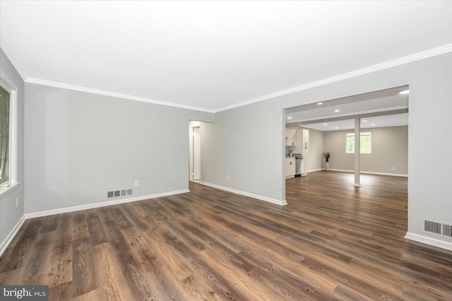 7533 Dover Ln, Lanham, MD 20706 - empty room with crown molding, dark wood finished floors, baseboards, and recessed lighting