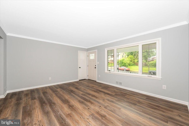 7533 Dover Ln, Lanham, MD 20706 - unfurnished room featuring ornamental molding, baseboards, and dark wood-style floors