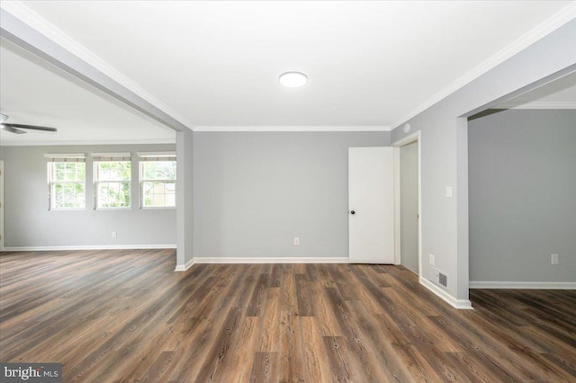 7533 Dover Ln, Lanham, MD 20706 - spare room with dark wood-style flooring, crown molding, baseboards, and a ceiling fan