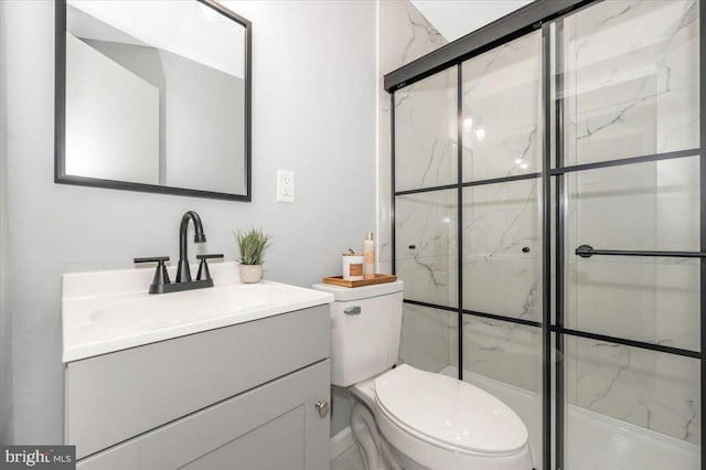 7533 Dover Ln, Lanham, MD 20706 - full bathroom featuring vanity, a marble finish shower, and toilet