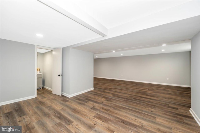 7533 Dover Ln, Lanham, MD 20706 - finished below grade area featuring wood finished floors, recessed lighting, and baseboards