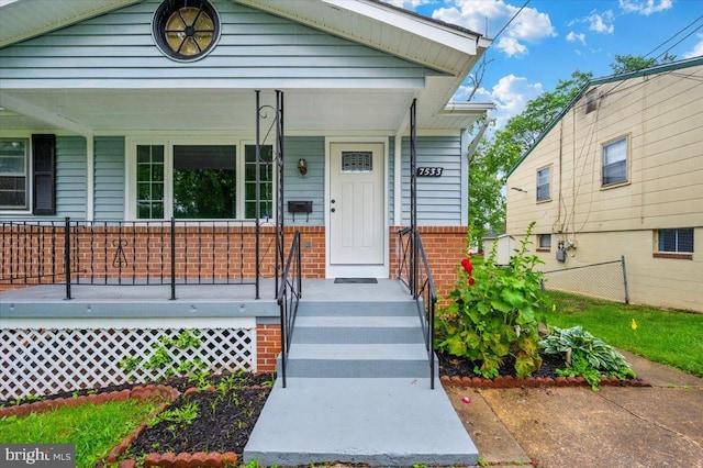 7533 Dover Ln, Lanham, MD 20706 - view of front of property featuring covered porch and brick siding
