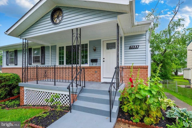 7533 Dover Ln, Lanham, MD 20706 - view of front of home featuring brick siding and covered porch