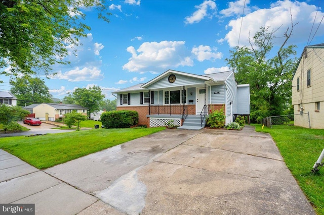 7533 Dover Ln, Lanham, MD 20706 - view of front of home featuring brick siding and a porch