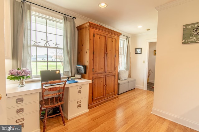 home office with ornamental molding, baseboards, recessed lighting, and light wood-style floors