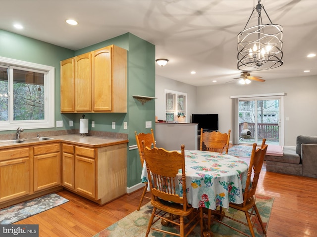 1304 Lakeview Dr, Cross Junction, VA 22625 - interior space with light wood-style flooring, a sink, open floor plan, recessed lighting, and ceiling fan with notable chandelier