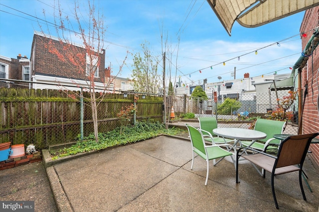 3257 Almond St, Philadelphia, PA 19134 - view of patio featuring a fenced backyard and outdoor dining space