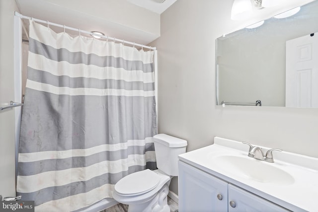 full bath with vanity, a shower with curtain, and toilet