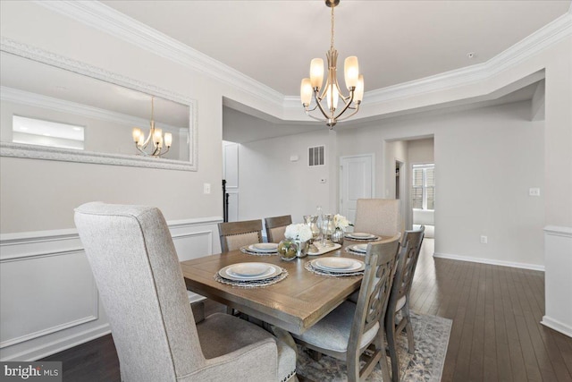 10815 Flying Change Ct, Upper Marlboro, MD 20772 - dining room featuring visible vents, dark wood-style floors, a chandelier, and ornamental molding